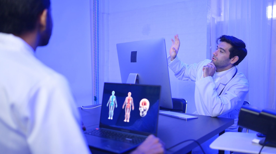 Scientists analyzing computer-animated medical visuals during pharmaceutical communications planning