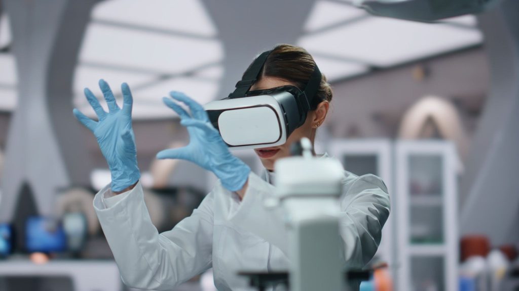 Science agency bioengineer using augmented reality to develop immersive scientific education solutions in a laboratory